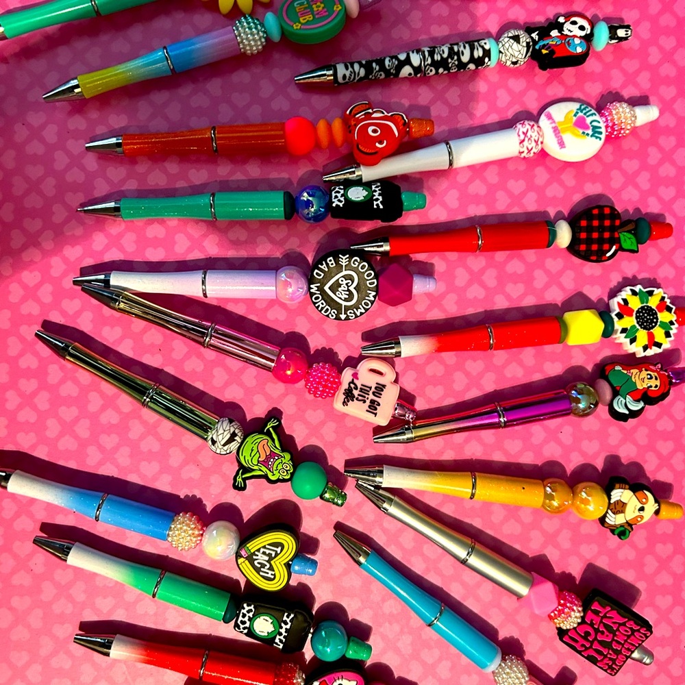 Focal pens brand new with decorative toppers